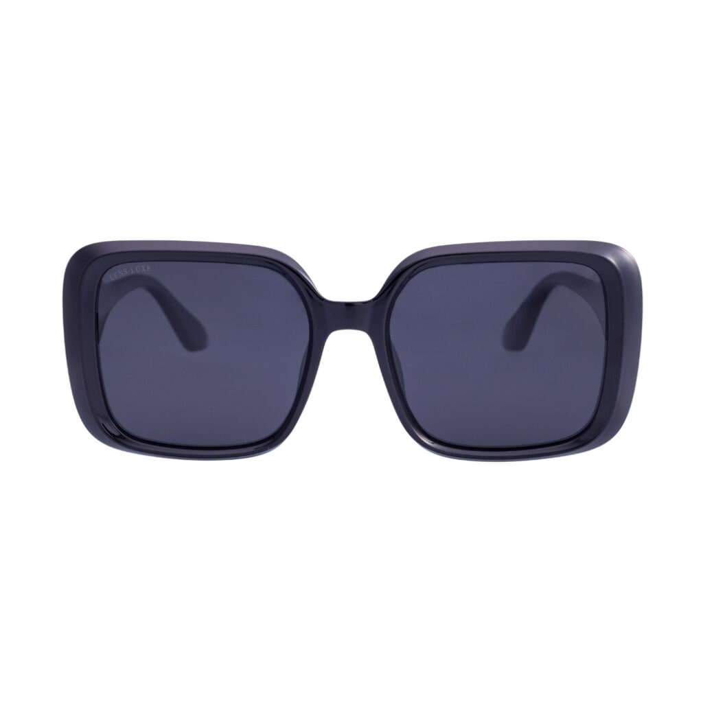Gafas de Sol Lens Luxe Amelia TR7559 C01 P242 con montura negra brillante y lentes gris oscuro, vista frontal.